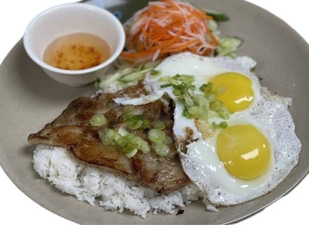 46. Lemon Grass Pork chop , 2 fried egg with Rice